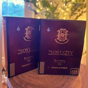 Pair of empty Arturo Fuente Opus X Lost City cigar boxes.